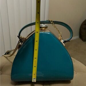 Elegant Teal Handbag
**Never used**